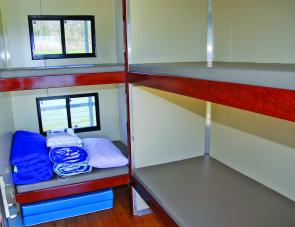 Four bunks are featured in this bedroom on the houseboat. 